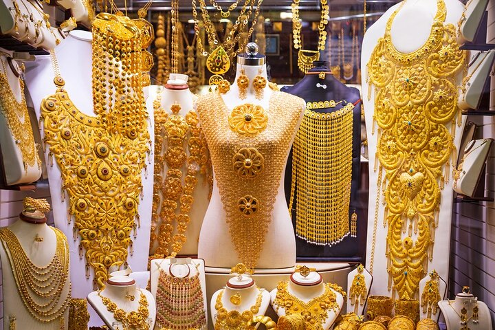 Discover the dazzling display of intricate gold jewelry at Dubai's Gold Souk where tradition meets craftsmanship in over 300 shops each telling a story of luxury and culture.